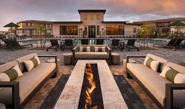 Fire pit for community use conveniently located behind the pool